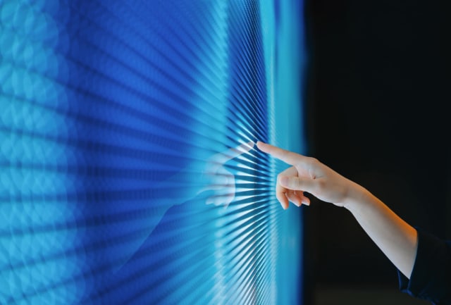 Image of hand using a digital screen