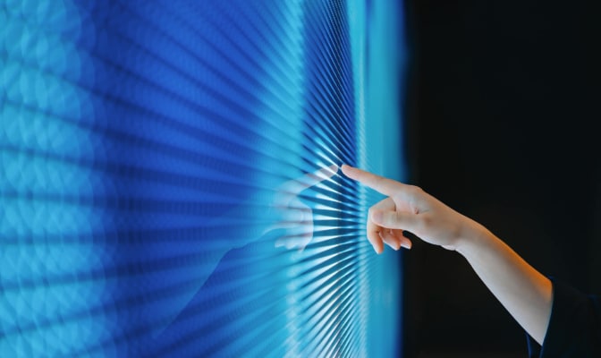 Image of hand using a digital screen